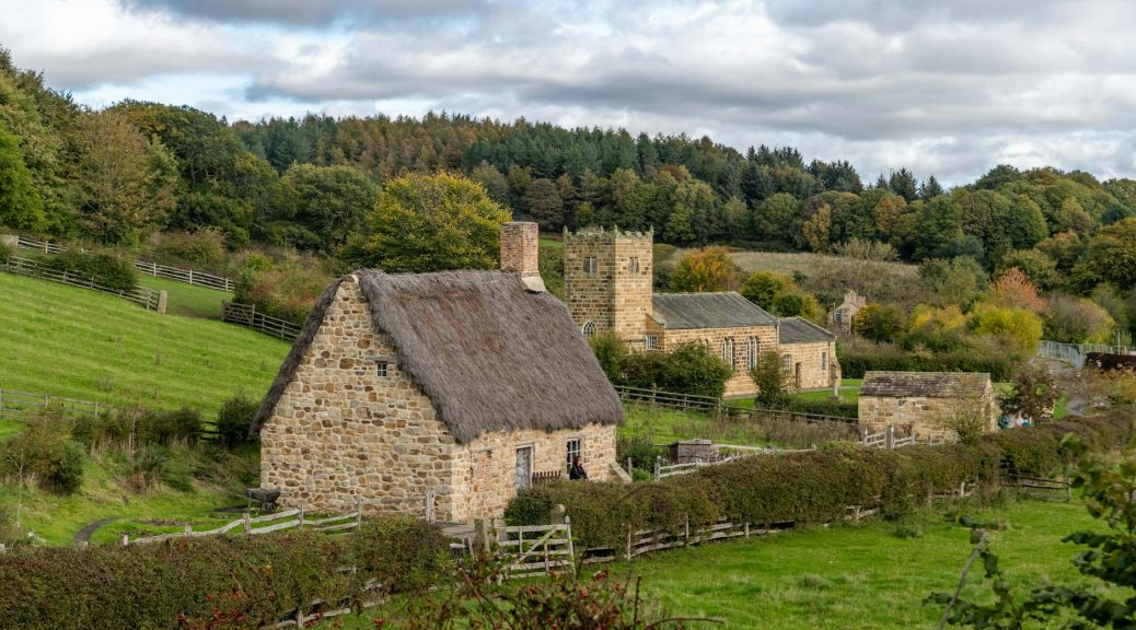 house and church in countryside